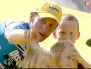 Lance Armstrong and his kids on the podium.